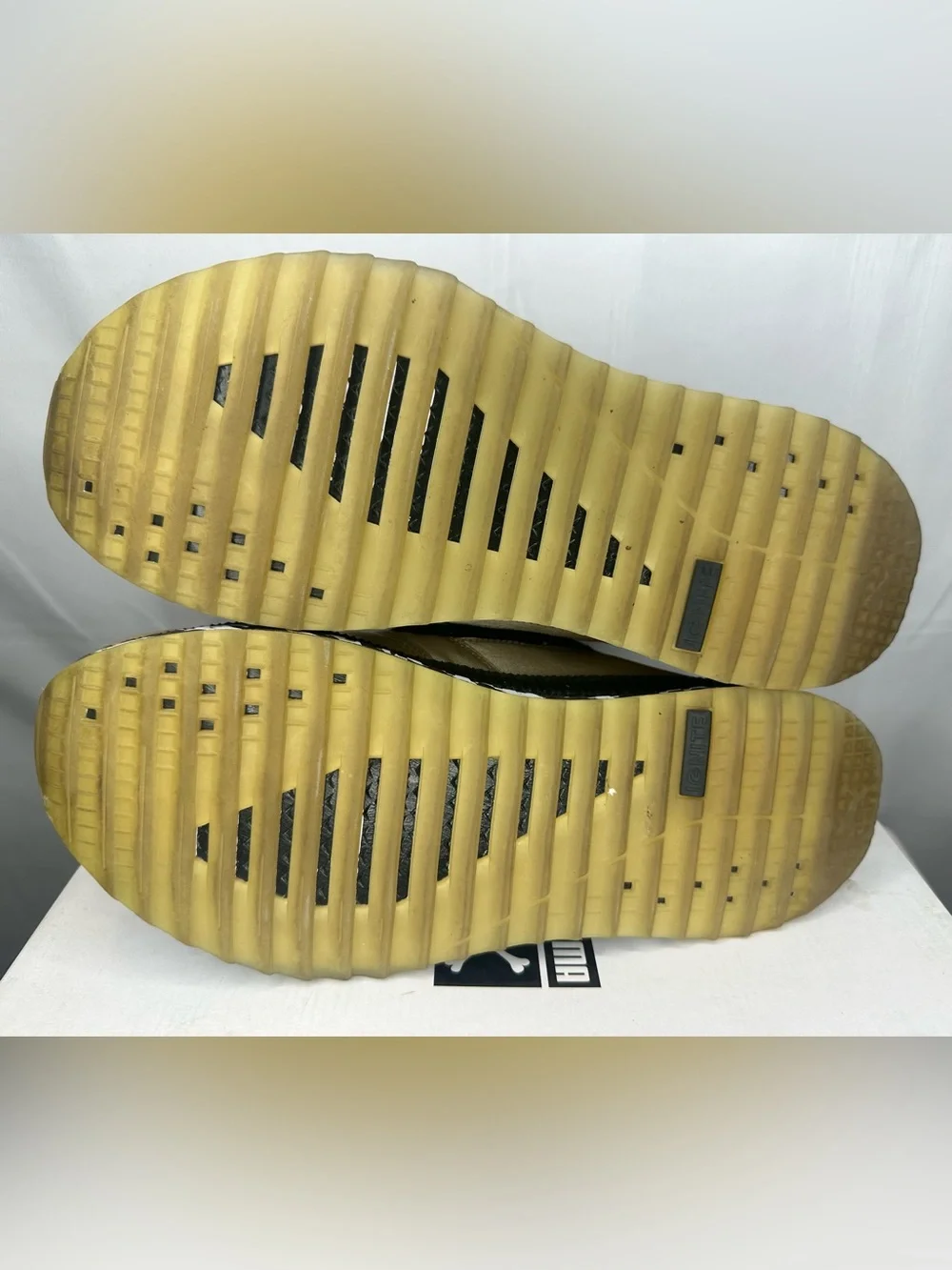 Puma Metallic Gold Sneakers with Black Details